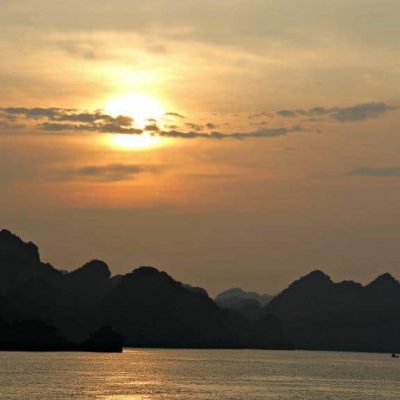 Cruising Spectacular Halong Bay in Luxury Paradise Found Sunset Halong Bay www.compassandfork.com