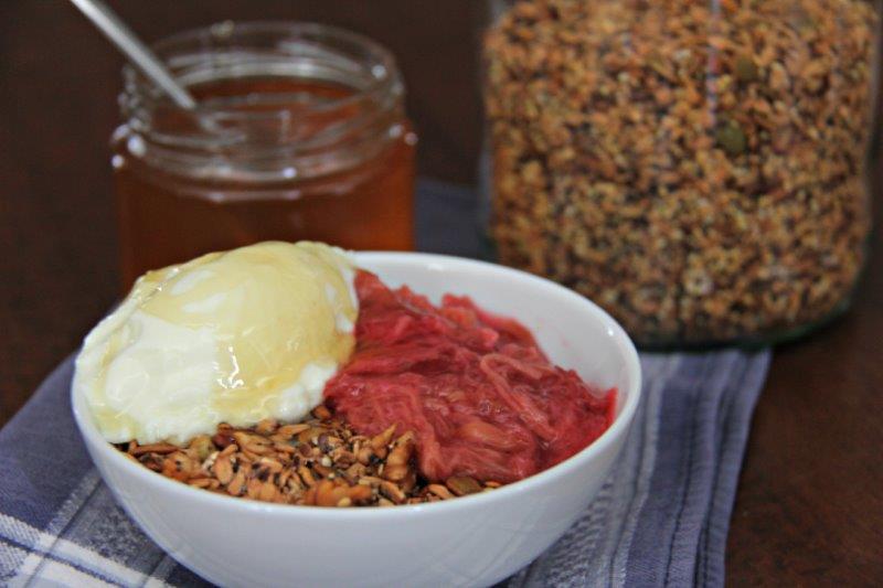 Simple home made muesli with yogurt rhubarb and honey