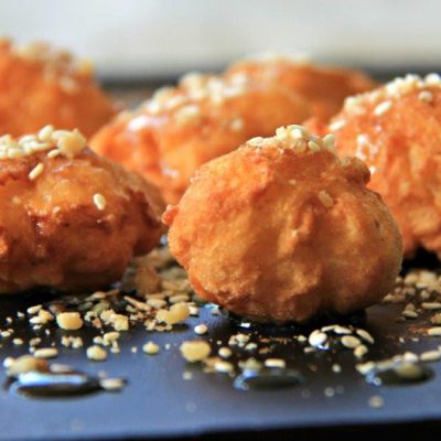 Serving - The Best Authentic Loukoumades Greek Donuts Recipe www.compassandfork.com